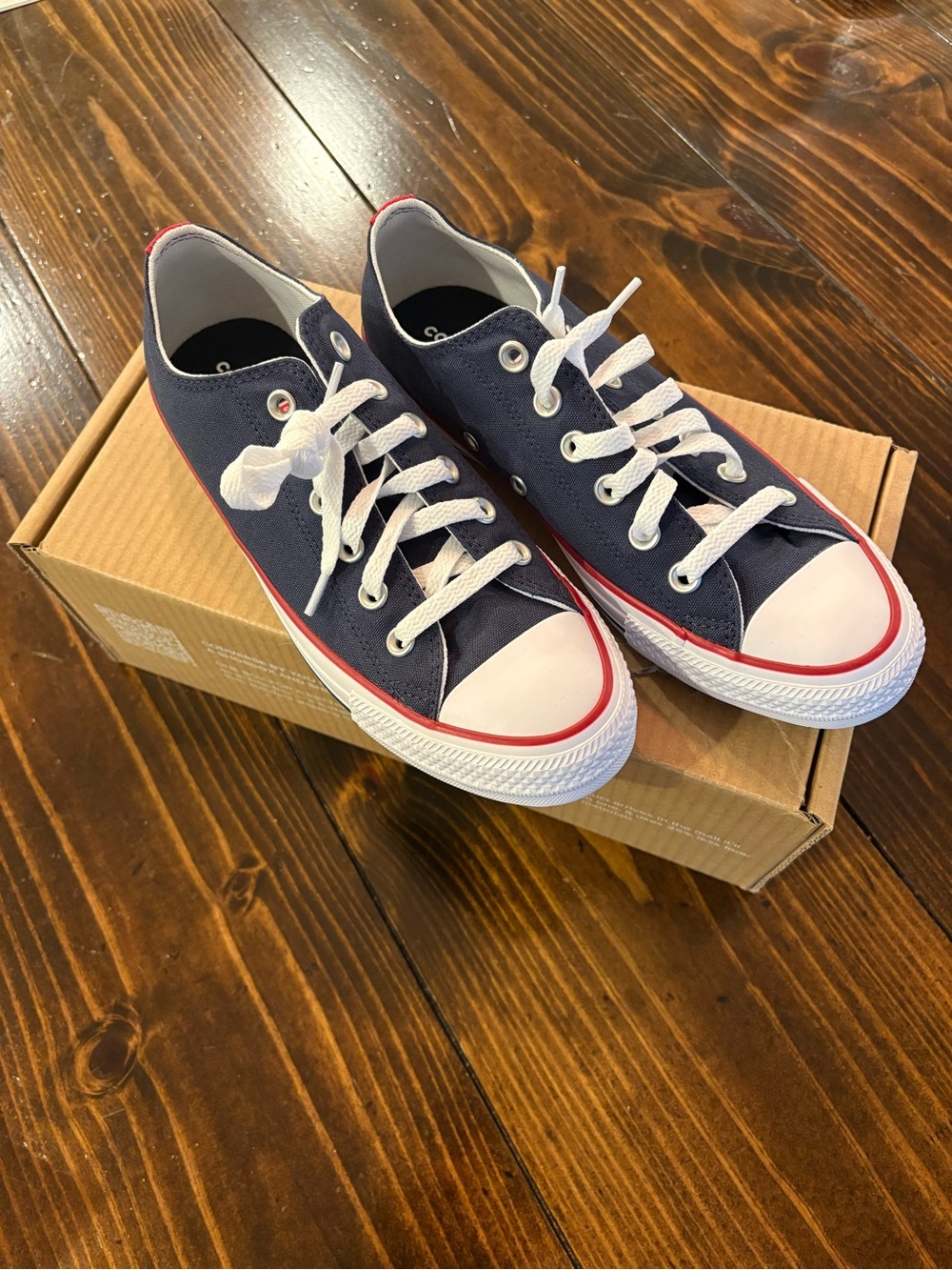 Converse Navy Low-Top Canvas Sneakers with White Laces and Red Sole Accent